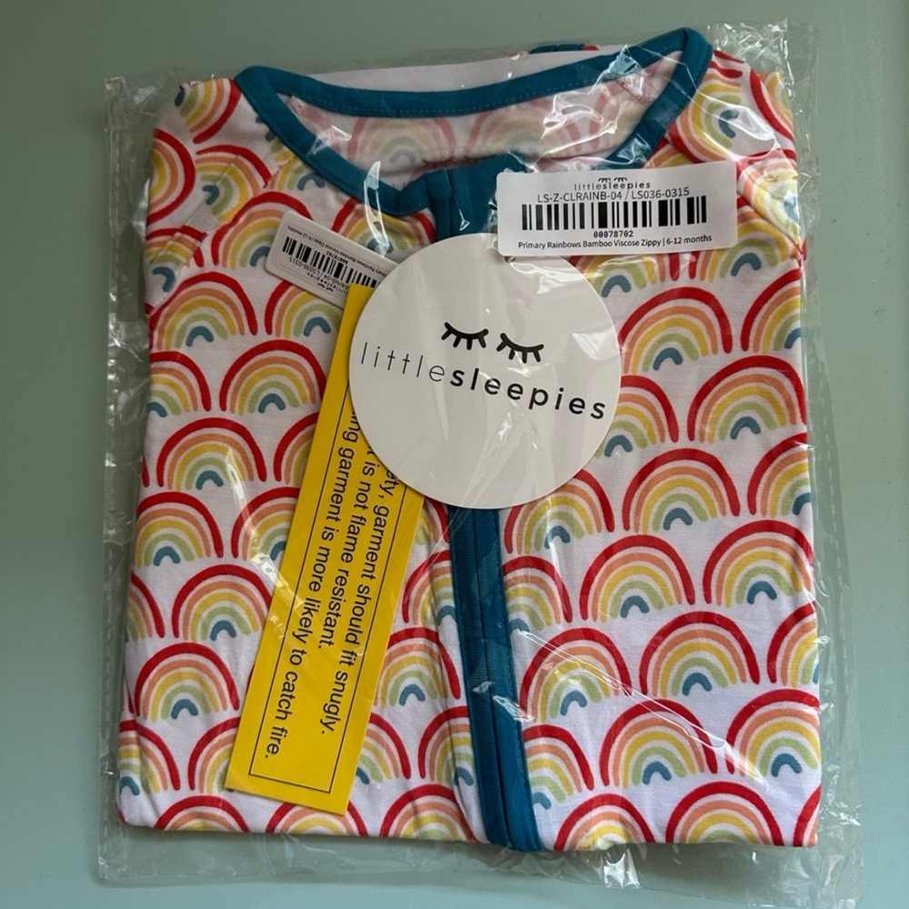 Little Sleepies primary rainbows zippy